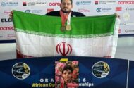ایزدی مدال‌های طلا و برنز خود را به شهید ماکان نصیری اهدا کرد